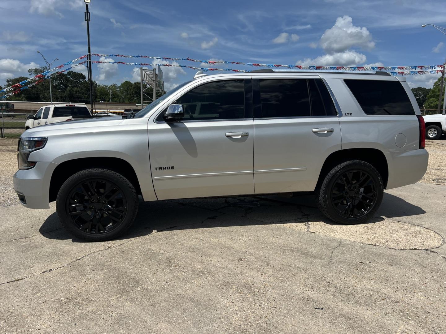 2016 Silver /Black Chevrolet Tahoe LTZ (1GNSCCKC4GR) with an 5.3L V8 engine, 6-Speed Automatic transmission, located at 4520 Airline Hwy, Baton Rouge, LA, 70805, (225) 357-1497, 30.509325, -91.145432 - 2016 Chevrolet Tahoe LTZ 5.3 V8 Gas, 166K Miles, Leather Seats, Sunroof, DVD, Cold A/C, All Power, Bose Stereo, Seats 7, Tow Package. FOR INFO PLEASE CONTACT JEFF AT 225-413-0981. CHECK OUT OUR A+ RATING WITH THE BETTER BUSINESS BUREAU. WE HAVE BEEN A FAMILY OWNED AND OPERATED BUSINESS AT THE SAME- Photo#1