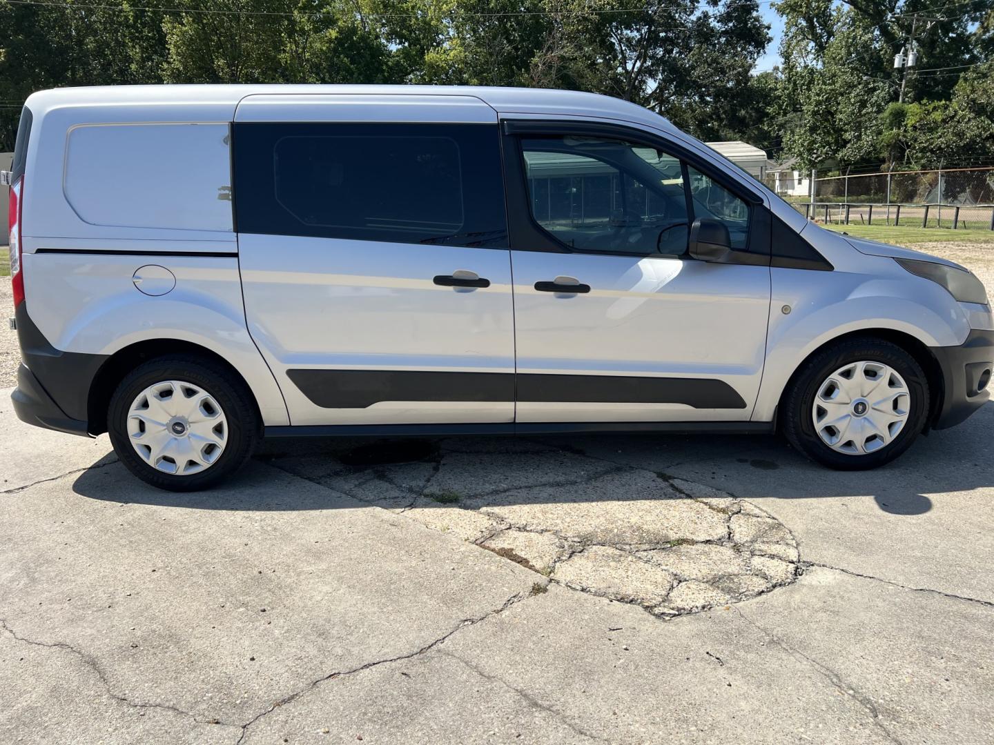 2016 Silver /Gray Ford Transit Connect Cargo Van XL (NM0LS7E72G1) with an 2.5L L4 DOHC 16V engine, 6-Speed Automatic transmission, located at 4520 Airline Hwy, Baton Rouge, LA, 70805, (225) 357-1497, 30.509325, -91.145432 - 2016 Ford Transit Connect XL 2.5 4 Cylinder Gas, 118K Miles, Cold A/C, Dual Sliding Doors, Shelving For Tools, Backup Camera. FOR INFO PLEASE CONTACT JEFF AT 225-413-0981. CHECK OUT OUR A+ RATING WITH THE BETTER BUSINESS BUREAU. WE HAVE BEEN A FAMILY OWNED AND OPERATED BUSINESS AT THE SAME LOCATION- Photo#4