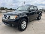 2016 Black /Gray Nissan Frontier SV (1N6AD0ER5GN) with an 4.0L V6 DOHC 24V engine, Automatic transmission, located at 4520 Airline Hwy, Baton Rouge, LA, 70805, (225) 357-1497, 30.509325, -91.145432 - 2016 Nissan Frontier Crew Cab SV 2WD 4.0 V6 Gas, 132K Miles, Automatic Transmission, Power Windows, Locks & Mirrors, Cold A/C, Bluetooth Radio, Tow Package. FOR INFO PLEASE CONTACT JEFF AT 225-413-0981. CHECK OUT OUR A+ RATING WITH THE BETTER BUSINESS BUREAU. WE HAVE BEEN A FAMILY OWNED AND OPERATED- Photo#0