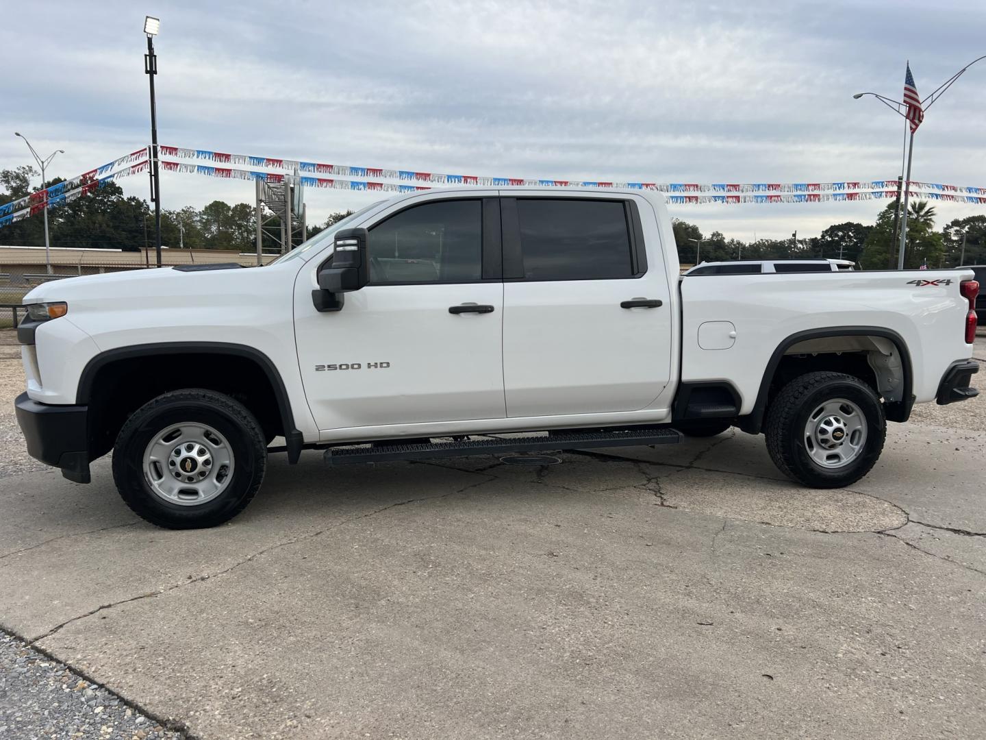 2020 White /Gray Chevrolet Silverado 2500HD Work Truck (1GC4YLE76LF) with an 6.6L V8 OHV 16V engine, 6-Speed Automatic transmission, located at 4520 Airline Hwy, Baton Rouge, LA, 70805, (225) 357-1497, 30.509325, -91.145432 - 2020 Chevrolet Silverado 2500HD Crew Cab 4X4 **ONE OWNER & NO ACCIDENTS** 6.6 V8 Gas, 128K Miles, Power Windows, Locks & Mirrors, Cold A/C, Backup Camera, Spray In Bedliner, Tow Package. FOR INFO PLEASE CONTACT JEFF AT 225-413-0981. CHECK OUT OUR A+ RATING WITH THE BETTER BUSINESS BUREAU. WE HAVE BE- Photo#1