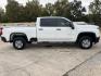 2020 White /Gray Chevrolet Silverado 2500HD Work Truck (1GC4YLE76LF) with an 6.6L V8 OHV 16V engine, 6-Speed Automatic transmission, located at 4520 Airline Hwy, Baton Rouge, LA, 70805, (225) 357-1497, 30.509325, -91.145432 - 2020 Chevrolet Silverado 2500HD Crew Cab 4X4 **ONE OWNER & NO ACCIDENTS** 6.6 V8 Gas, 128K Miles, Power Windows, Locks & Mirrors, Cold A/C, Backup Camera, Spray In Bedliner, Tow Package. FOR INFO PLEASE CONTACT JEFF AT 225-413-0981. CHECK OUT OUR A+ RATING WITH THE BETTER BUSINESS BUREAU. WE HAVE BE- Photo#4