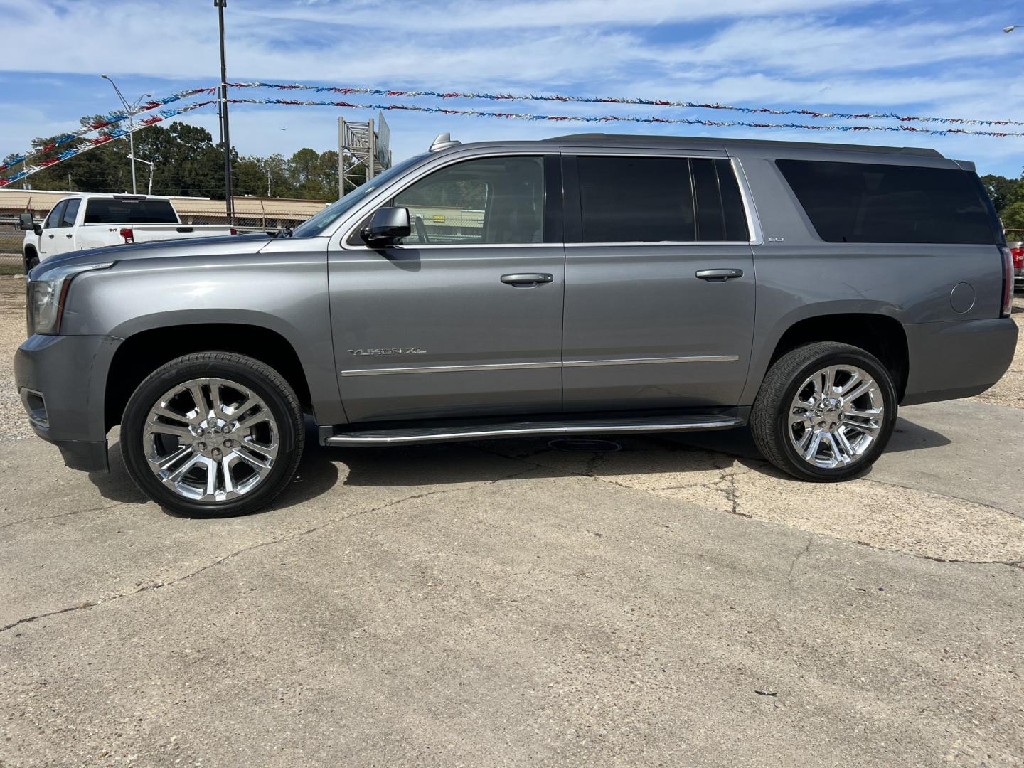 2018 Gray Metallic /Black GMC Yukon XL SLT (1GKS1GKC7JR) with an 5.3L V8 engine, 6-Speed Automatic transmission, located at 4520 Airline Hwy, Baton Rouge, LA, 70805, (225) 357-1497, 30.509325, -91.145432 - 2018 GMC Yukon XL SLT 2WD 5.3 V8 Gas, 132K Miles, Heated & Cooled Leather, Seats 7, Sunroof, DVD, Bose Stereo, All Power, Cold A/C, Power Liftgate, Backup Camera, Tow Package. Has Some Minor Scratches. FOR INFO PLEASE CONTACT JEFF AT 225-413-0981. CHECK OUT OUR A+ RATING WITH THE BETTER BUSINESS BU- Photo#1