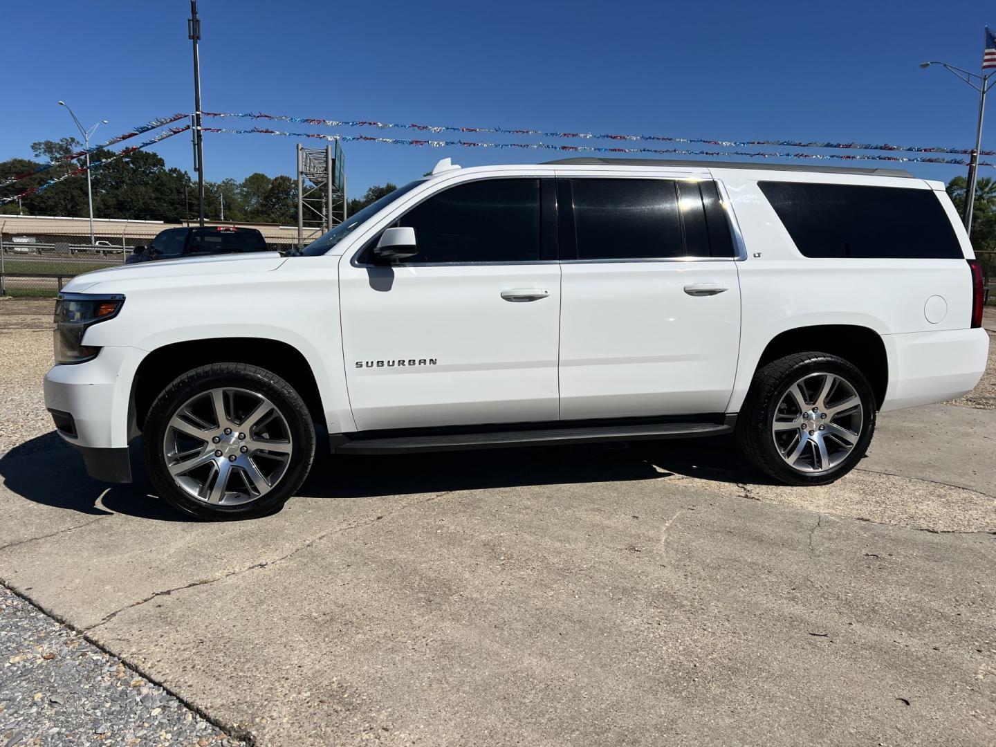 2018 White /Tan Chevrolet Suburban LT (1GNSCHKCXJR) with an 5.3L V8 engine, 6-Speed Automatic transmission, located at 4520 Airline Hwy, Baton Rouge, LA, 70805, (225) 357-1497, 30.509325, -91.145432 - 2018 Chevrolet Suburban LT 2WD **NO ACCIDENTS** 5.3 V8 Gas, 161K Miles, Heated Leather, Seats 7, Bose Stereo, All Power, Cold A/C, Power Liftgate, Backup Camera, Tow Package. FOR INFO PLEASE CONTACT JEFF AT 225-413-0981. CHECK OUT OUR A+ RATING WITH THE BETTER BUSINESS BUREAU. WE HAVE BEEN A FAMILY- Photo#1